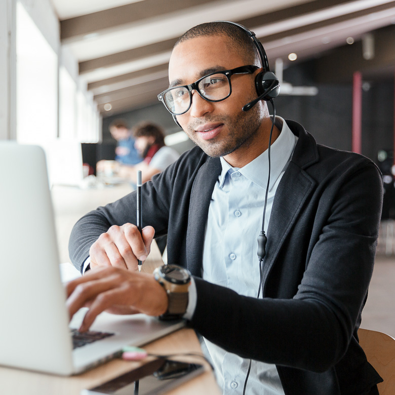 photo of a sales person on a call