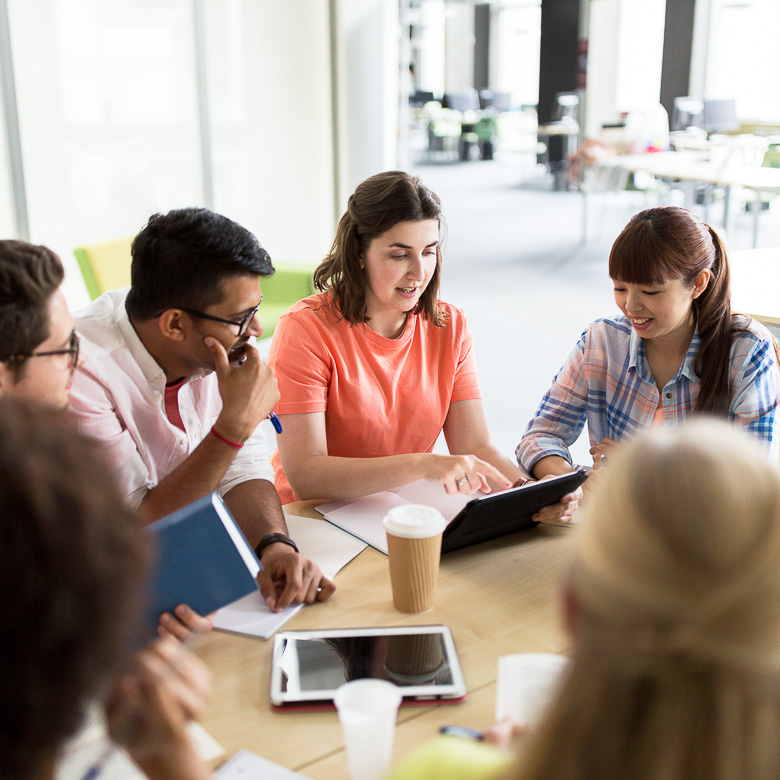 photo of a team working together